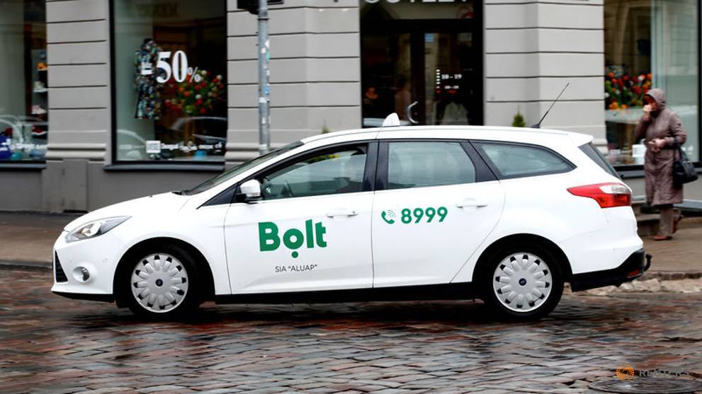942a9d8-file-photo--a-bolt--formerly-known-as-taxify--sign-is-seen-on-the-taxi-car-in-riga-1