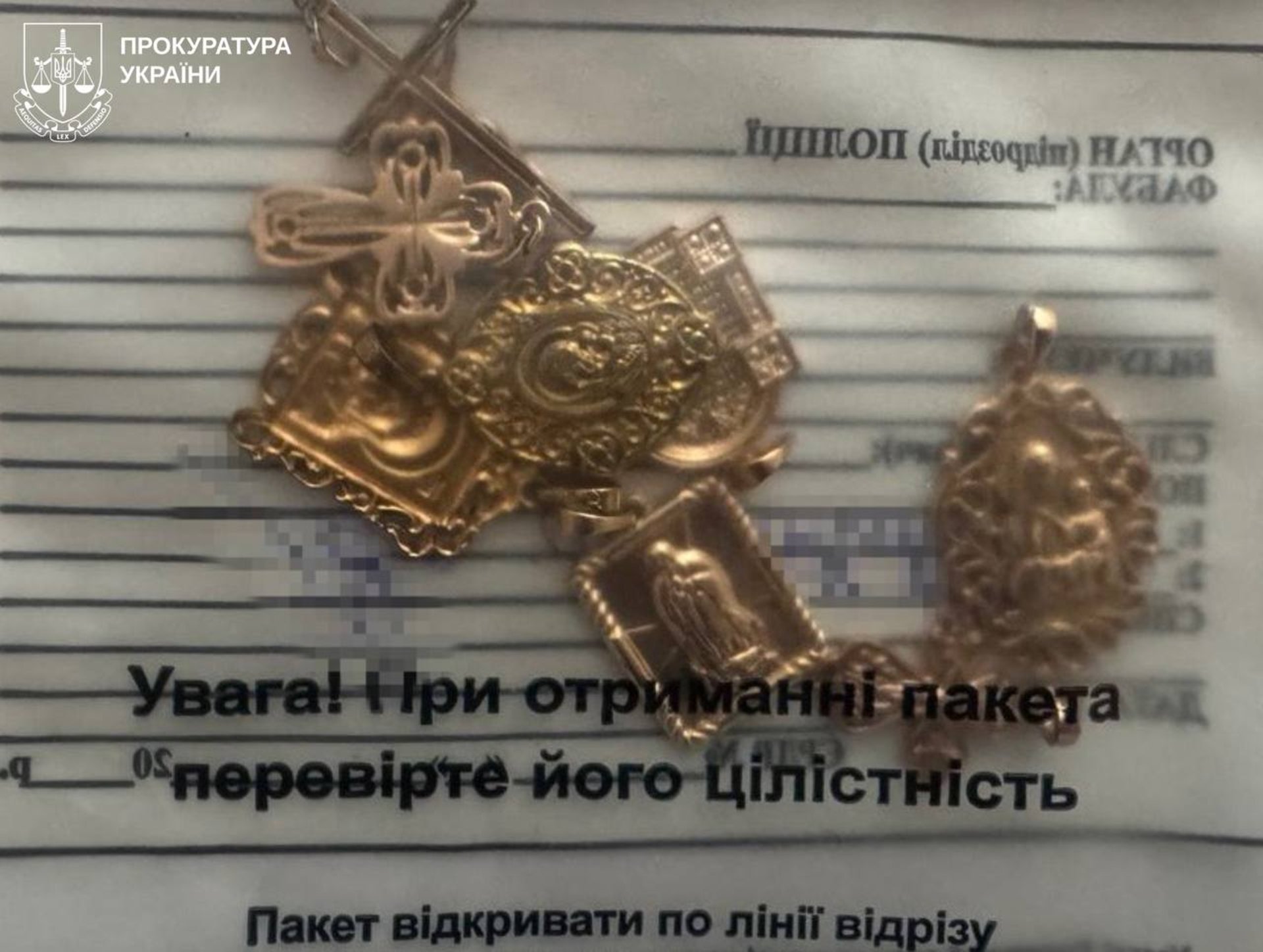 Медсестра моргу на Харківщині викрадала у загиблих воїнів мобільні телефони, ланцюжки і обручки